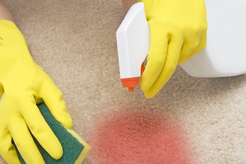 Deep cleaning a fabric sofa and armchair in Frognal
